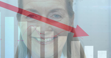 Senior woman merging bar chart, line graph and red downward arrow in studio, wearing collared shirt. Executive, headshot, mature, professional, business, finance, analyticsの写真素材