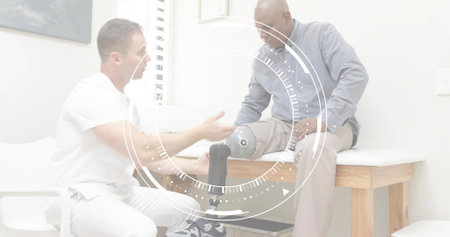 Fitting clinician in scrubs kneeling adjusting prosthetic leg by patient with socket in clinic. Prosthesis, limb, carbonfiber, orthotics, medical, overlay, rehabilitationの写真素材