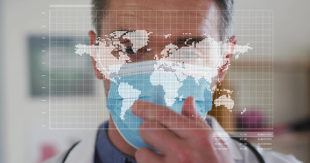 Adjusting doctor pulling blue mask at clinic in lab coat and stethoscope with world map overlay. Physician, healthcare, epidemiology, global, dataviz, analytics, minimalistの写真素材