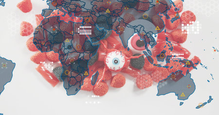 Displaying red and pink candy cluster on studio surface, showing white eyeball candy, map overlay. Sweets, confections, iris, orb, flatlay, globe, infographicの写真素材