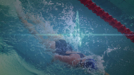 Swimmer is gliding underwater in flat design pool, with goggles and lane divider for sports. Athleticism, wellness, aquatic, motion, fluidity, fitness, recreationの写真素材