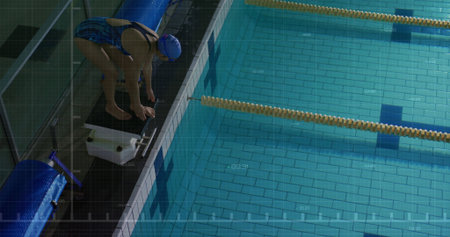 Swimmer is crouching on starting block in flat design sports featuring blue swim cap, lane dividers....