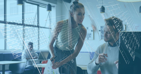 Leaning woman pointing with chart at screen, coworker in sweater gesturing in office with holograms. Collaboration, business, modern, analytics, workspace, productivity, innovationの写真素材