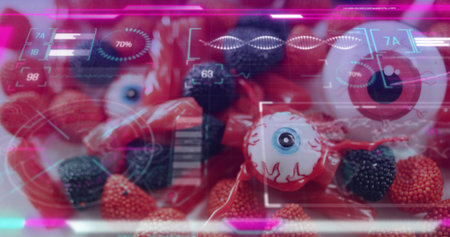 Focusing white eyeball candy showing blue iris, red veins at tabletop, with HUD, gumdrops, berries. Macro, orb, confections, neon, futuristic, glossy, bokehの写真素材