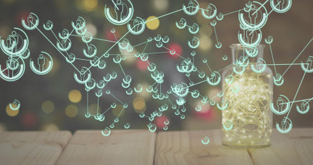 Glowing glass jar with warm lights sitting on right wood table, cyan network overlay, copy space. Luminary, glow, centerpiece, bokeh, decor, digital, holographicの写真素材