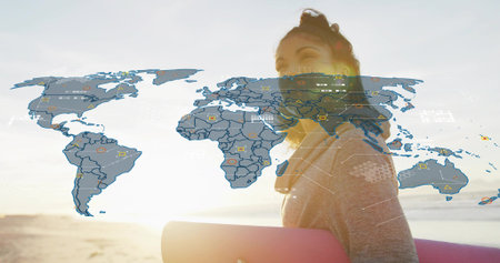 Digital animation of data processing over world map and spinning globe against black background