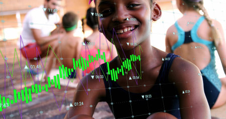 Smiling girl in dark one-piece swimsuit filling frame, sitting on pool deck with graph overlays. Waterside, graphics, kids, group, instructor, supervision, outdoorの写真素材