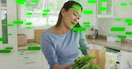 Unpacking mid adult woman arranging leafy greens from paper bag in home kitchen, digital overlay....