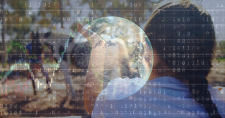 Standing adult woman and child in park wearing blue, light tops, showing globe binary stock charts....