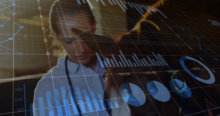 Reviewing data, female doctor wearing white coat and stethoscope in clinic viewing digital charts. Physician, clinical, hospital, collaboration, overlay, analytics, visualizationの写真素材