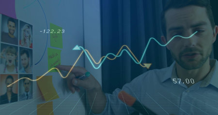 Gesturing man on right blue shirt showing data at office board pointing sticky notes ring holograms....