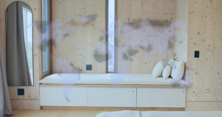 Showing built-in bench with white cushion and three round pillows under narrow window, dotted map....