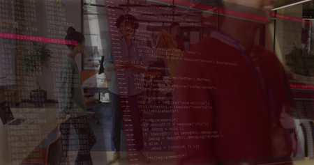 Discussing six coworkers reviewing code on monitors in open plan office, with faint code overlay....