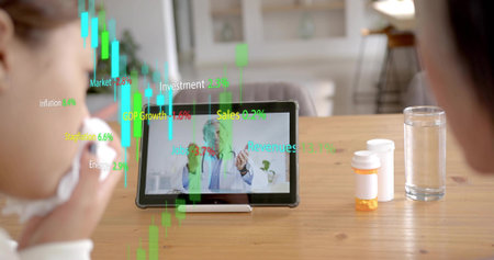 Displaying tablet on stand showing doctor gesturing at home table, pills visible. Telehealth,...