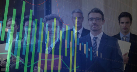 Posing six executives in suits holding folders and tablet in meeting room, with financial overlay....