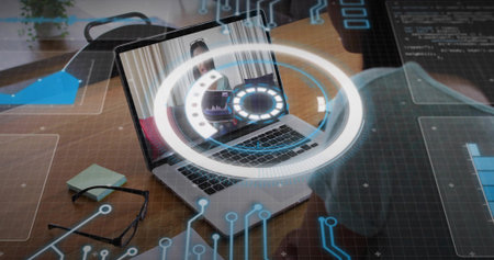 Laptop with augmented UI displaying remote host at desk in office, man wearing dark jacket, glasses....