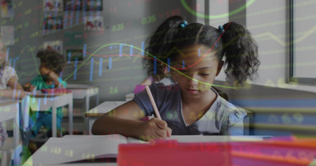 Leaning student with pigtails in gray top writing in workbook at school, red case, chart overlay. Classroom, learning, desks, posters, sunlight, window, focusの写真素材