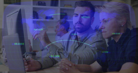 Reviewing data, 3 colleagues in shirts pointing at monitor at office, holding glasses, HUD overlay....