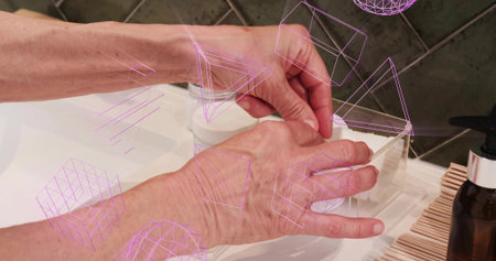 Handling cotton pad, woman's hands working at bathroom countertop with cream jar and pump bottle....
