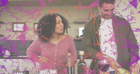 Talking woman in mauve top, olive-shirted man chopping in kitchen with knife and purple overlay....