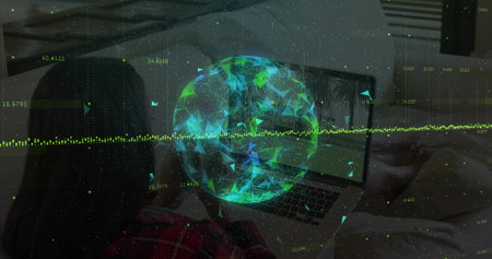 Working woman in red plaid shirt seated on bed facing laptop in bedroom, with holographic data....