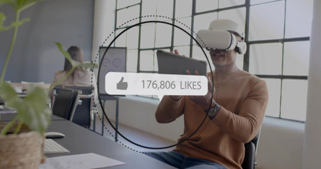 Using tablet wearing VR headset and sweater man showing overlay in office, copy space. Virtual,...