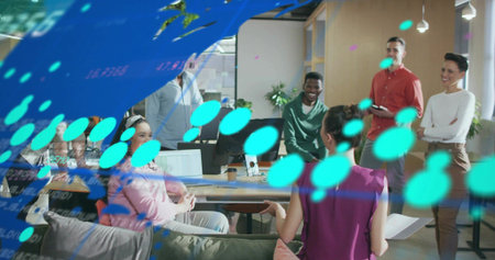 Leading woman in magenta top gesturing, holding papers at office with laptops, turquoise overlay....