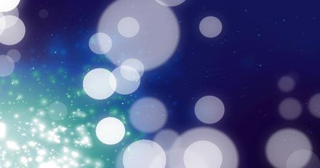 Glowing overlapping soft circular bokeh discs forming gradient backdrop with white teal sparkles....
