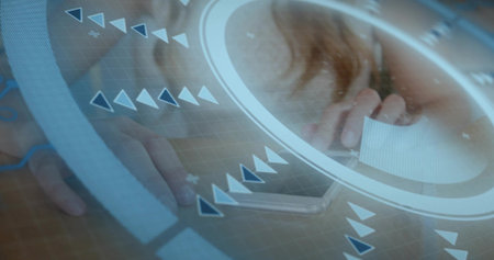 Holding white card near mouth, woman reaching for phone on wood table, with HUD overlay....