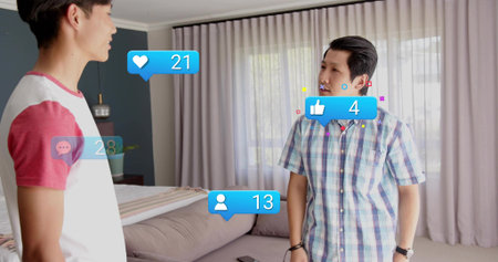 Talking adult, teen males in raglan tee and plaid shirt, standing in bedroom with phone overlays....