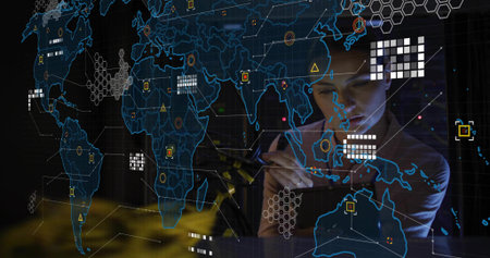 Working woman in dark blouse manipulating stylus on tablet at ops center, hologram map, copy space....