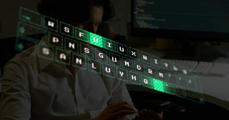 Holding smartphone, man wearing white shirt studying code at office desk with holographic keyboard....