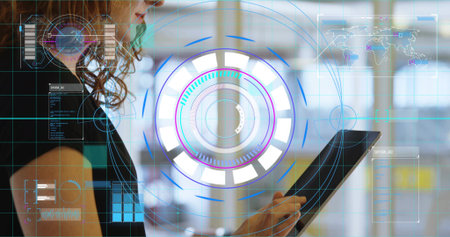 Holding tablet, woman on left navigating circular UI in office, sleeveless dark top, copy space....