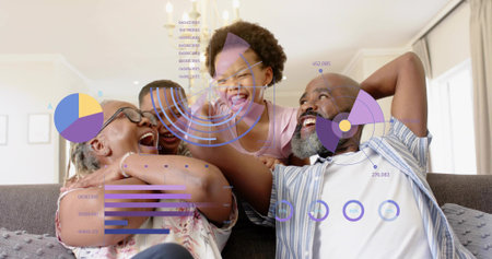 Laughing family of four leaning on sofa in living room, girl in pink top, infographic overlays. Multigenerational, couch, home, togetherness, joy, bonding, chartsの写真素材