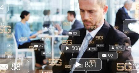 Checking suited man in tie tapping phone at office lounge with laptop, copy space. Professional, corporate, technology, digital, collaboration, networking, tabletの写真素材