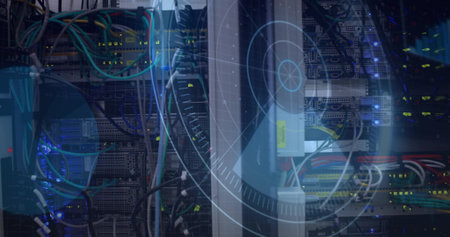 Displaying vertical server rack holding network switches, blade servers at data center, HUD overlay....