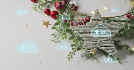 Displaying frosted star ornament on white tabletop with greenery and blue cloud icons, copy space....