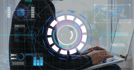 Typing mature businessman in dark pinstripe jacket working on laptop in bright room, virtual HUD....