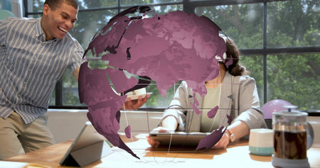 Showing purple 3D globe overlay at office table, coworkers in business wear using tablet smartphone....