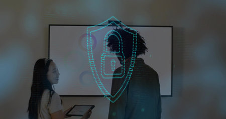 Showing woman headband holding tablet man dark blazer facing wall display in meeting shield padlock....