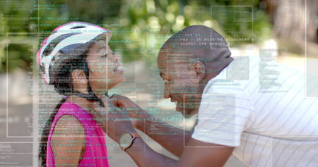 Leaning man fastening helmet strap on girl wearing pink top at park path, showing overlay....