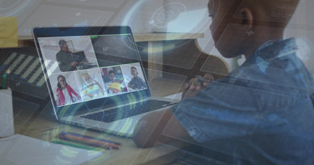 Leaning student in blue shirt using laptop at home, wearing headphones, digital overlay, copy space....
