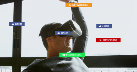Leaning man in dark sweater, raising arm by large window with VR headset and floating notifications....