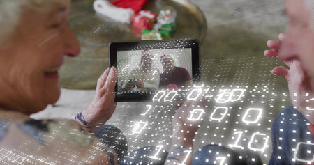 Holding couple watching tablet at home red-hat callers mug visible, candy tray bracelet binary grid....