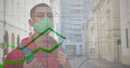 Standing Indian in red hoodie holding backpack on narrow street, with green mask and data graphs....
