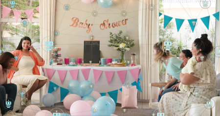 Smiling mom-to-be in white dress orange cardi holding bump at home baby shower cupcakes, copy space....
