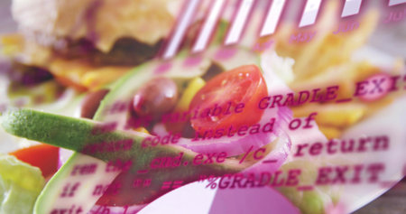 Showing salad sitting on table with halved tomato, onion rings, avocado and magenta code overlay....