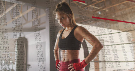 Standing boxer posing hands-on-hips at boxing ring with code overlay, wearing red hand wraps....