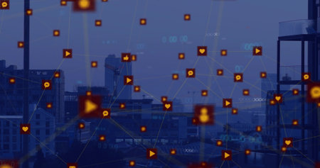 Floating digital network overlay lighting urban skyline at dusk, with orange icons and glass tower....