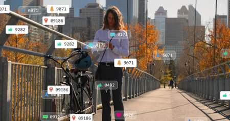 Holding phone, man wearing shirt scanning floating icons on park bridge with bicycle and helmet....